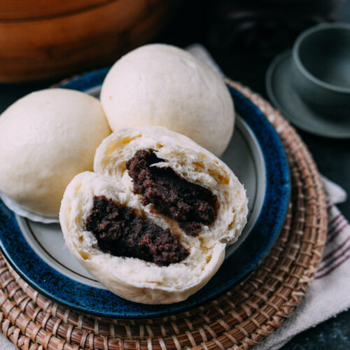 A red bean paste bun pulled in half